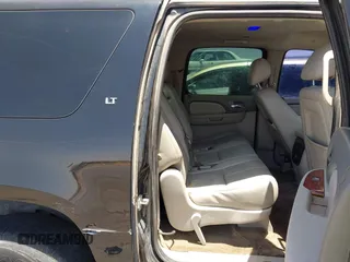 2013 Chevrolet Suburban LT z VIN 1GNSCJE02DR176393, wystawiony jako IAAI lot #42483598 z przebiegiem 266 075 mil mil oraz . Historia ofert i sprzedaży dostępna na DreamBid. Obrazek 8.