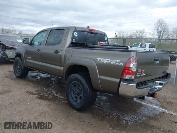 2015 Toyota Tacoma with VIN 3TMLU4EN8FM198605, listed as a IAAI auction lot 42039238 with 132,109 mi miles and . Bid and sale history available at DreamBid. Image 3.