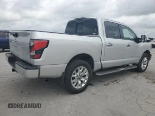2020 Nissan Titan SL z VIN 1N6AA1ED1LN505973, wystawiony jako Copart lot #58721985 z przebiegiem 103 245 mil mil oraz Tytuł czysty. Historia ofert i sprzedaży dostępna na DreamBid. Obrazek 3.