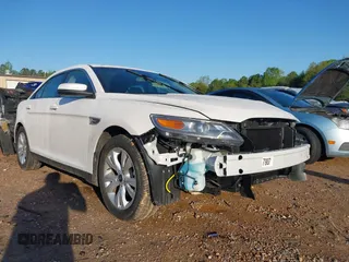 2011 Ford Taurus SEL z VIN 1FAHP2EW8BG183090, wystawiony jako IAAI lot #41983499 z przebiegiem 10 391 mil mil oraz . Historia ofert i sprzedaży dostępna na DreamBid. Obrazek 1.
