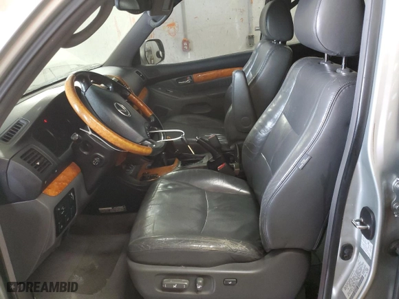 2003 Lexus GX 470 with VIN JTJBT20XX30004874, listed as a Copart auction lot 82016464 with 303,929 mi miles and Salvage Title. Bid and sale history available at carsss.com. Image 7.