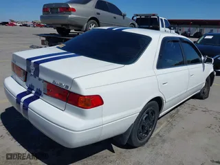 2000 Toyota Camry CE with VIN JT2BG22K8Y0415361, listed as a IAAI auction lot 41760193 with 250,333 mi miles. Bid and sale history available at carsss.com. Image 4.