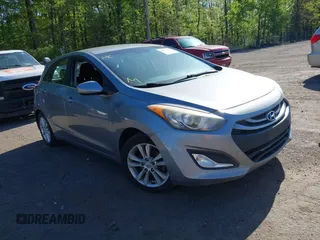 2013 Hyundai Elantra GT with VIN KMHD35LE6DU084154, listed as a IAAI auction lot 42079602 with 194,314 mi miles. Bid and sale history available at carsss.com. Image 1.