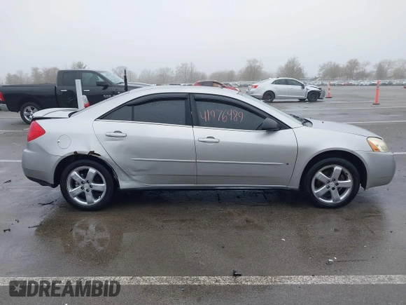 2006 Pontiac G6 GT with VIN 1G2ZH558764108360, listed as a IAAI auction lot 41976489 with Not provided miles and . Bid and sale history available at DreamBid. Image 13.