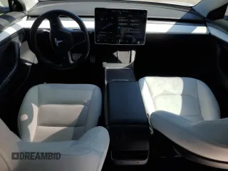 2021 Tesla Model 3 Performance with VIN 5YJ3E1EC5MF077493, listed as a Copart auction lot 48067045 with 44,285 mi miles and Salvage Title. Bid and sale history available at DreamBid. Image 8.