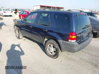 2003 Ford Escape XLT Popular 2 with VIN 1FMYU93103KE17610, listed as a IAAI auction lot 41766806 with 1 mi miles. Bid and sale history available at carsss.com. Image 3.