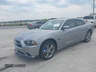 2014 Dodge Charger RT Plus with VIN 2C3CDXDT7EH159703, listed as a IAAI auction lot 41763606 with 132,333 mi miles. Bid and sale history available at carsss.com. Image 2.