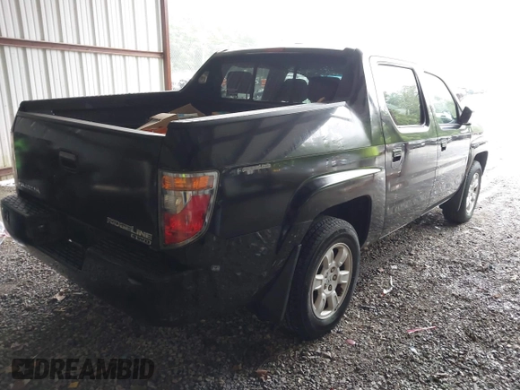 2007 Honda Ridgeline RTL with VIN 2HJYK16547H549241, listed as a IAAI auction lot 42282477 with 214,685 mi miles and . Bid and sale history available at DreamBid. Image 4.