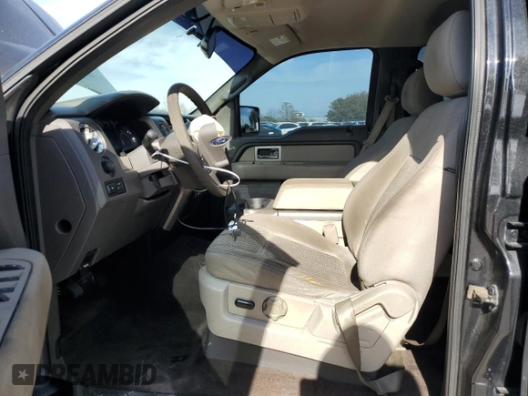 2010 Ford F-150 XL with VIN 1FTFW1CV6AFD01991, listed as a Copart auction lot 42699005 with 151,049 mi miles and Salvage Title. Bid and sale history available at DreamBid. Image 7.