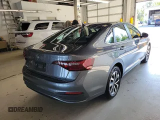 2024 Volkswagen Jetta S with VIN 3VW5M7BU5RM079143, listed as a IAAI auction lot 42851039 with 22,619 mi miles and . Bid and sale history available at DreamBid. Image 2.
