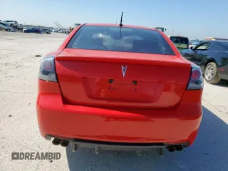 2009 Pontiac G8 z VIN 6G2ER57779L184240, wystawiony jako Copart lot #53801105 z przebiegiem 214 448 mil mil oraz Czysty tytuł • Clean title. Historia ofert i sprzedaży dostępna na DreamBid. Obrazek 6.