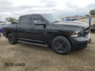 2022 Ram 1500 Tradesman with VIN 3C6RR6KGXNG310340, listed as a Copart auction lot 43163405 with 101,282 mi miles and Salvage title. Bid and sale history available at DreamBid. Image 4.