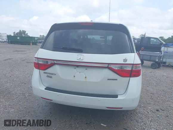 2013 Honda Odyssey Touring with VIN 5FNRL5H9XDB049390, listed as a IAAI auction lot 42532861 with 129,376 mi miles and . Bid and sale history available at DreamBid. Image 17.