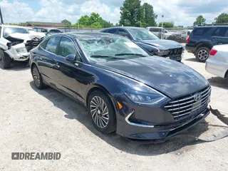 2021 Hyundai Sonata Hybrid SEL with VIN KMHL34JJ5MA026656, listed as a IAAI auction lot 39679569 with 28,005 mi miles. Bid and sale history available at carsss.com. Image 1.