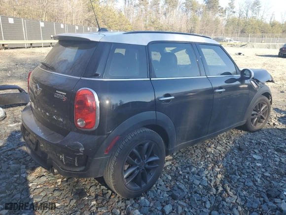 2014 MINI Cooper Countryman S with VIN WMWZC3C51EWP25860, listed as a Copart auction lot 47460235 with 128,314 mi miles and Salvage Title. Bid and sale history available at carsss.com. Image 3.