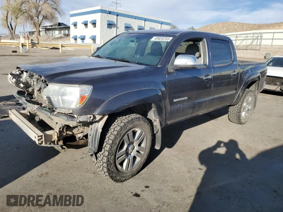 2015 Toyota Tacoma z VIN 3TMLU4EN3FM165978, wystawiony jako Copart lot #49920255 z przebiegiem 134 974 mil mil oraz Szkoda całkowita • Salvage title. Historia ofert i sprzedaży dostępna na DreamBid. Obrazek 1.