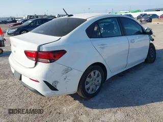 2023 Kia Rio LX with VIN 3KPA24AD9PE598789, listed as a IAAI auction lot 42019297 with 16,232 mi miles. Bid and sale history available at carsss.com. Image 4.