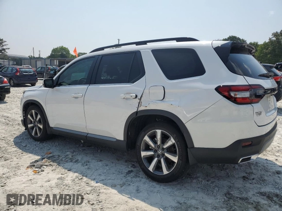 2023 Honda Pilot Touring with VIN 5FNYG2H77PB014212, listed as a Copart auction lot 59222715 with 4,507 mi miles and Salvage title. Bid and sale history available at DreamBid. Image 2.