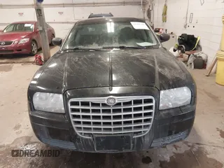 2007 Chrysler 300 with VIN 2C3LA43R17H860639, listed as a IAAI auction lot 41481326 with 163,837 mi miles. Bid and sale history available at carsss.com. Image 12.