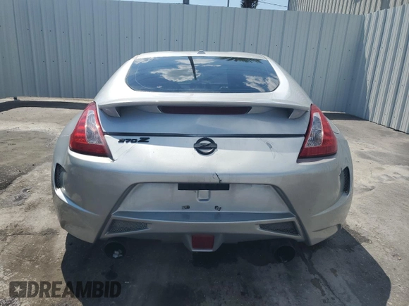 2016 Nissan 370Z Sport с VIN JN1AZ4EH9GM934860, выставлен на аукционе Copart как лот 54613555 с пробегом Не указан миль и Чистый • Clean title. История ставок и продаж доступна на DreamBid. Изображение 6.