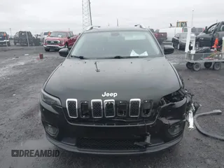 2019 Jeep Cherokee Latitude with VIN 1C4PJLCB1KD339906, listed as a IAAI auction lot 41539248 with 123,243 mi miles and . Bid and sale history available at carsss.com. Image 13.