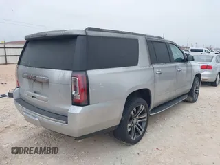 2019 GMC Yukon XL Denali with VIN 1GKS1HKJ0KR257673, listed as a IAAI auction lot 41375951 with 71,291 mi miles. Bid and sale history available at carsss.com. Image 4.