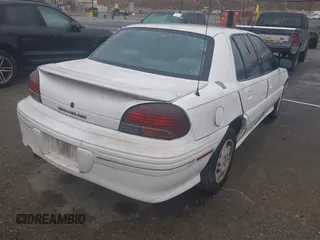 1998 Pontiac Grand Am SE2 with VIN 1G2NE52T7WM513702, listed as a IAAI auction lot 41503141 with 302,315 mi miles. Bid and sale history available at carsss.com. Image 4.