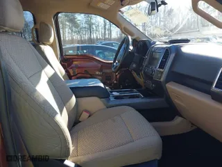 2015 Ford F-150 XLT w/HD Payload Pkg with VIN 1FTFW1EG9FFC44739, listed as a IAAI auction lot 41193582 with 121,169 mi miles. Bid and sale history available at carsss.com. Image 5.