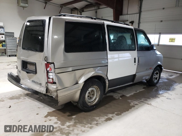 2001 Chevrolet Astro z VIN 1GNEL19W01B143781, wystawiony jako Copart lot #58476275 z przebiegiem 157 888 mil mil oraz Szkoda całkowita • Salvage title. Historia ofert i sprzedaży dostępna na DreamBid. Obrazek 3.