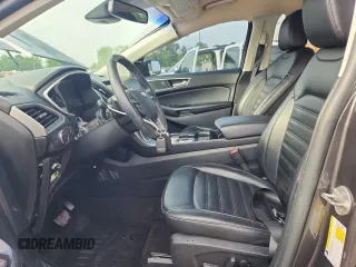 2020 Ford Edge SEL с VIN 2FMPK4J97LBA71577, выставлен на аукционе Copart как лот 60028525 с пробегом 66 365 миль миль и Списание • Salvage title. История ставок и продаж доступна на DreamBid. Изображение 7.