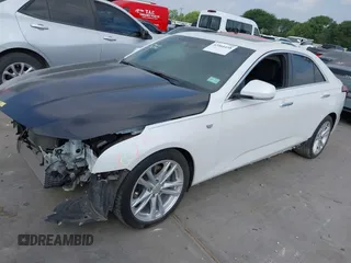 2022 Cadillac CT4 Luxury z VIN 1G6DJ5RK3N0114231, wystawiony jako IAAI lot #42064458 z przebiegiem 18 753 mil mil oraz . Historia ofert i sprzedaży dostępna na DreamBid. Obrazek 2.
