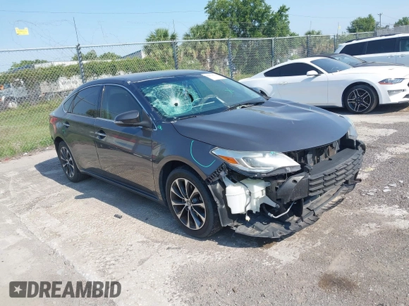 2016 Toyota Avalon Limited z VIN 4T1BK1EB6GU194843, wystawiony jako IAAI lot #42274532 z przebiegiem 100 759 mil mil oraz . Historia ofert i sprzedaży dostępna na DreamBid. Obrazek 1.