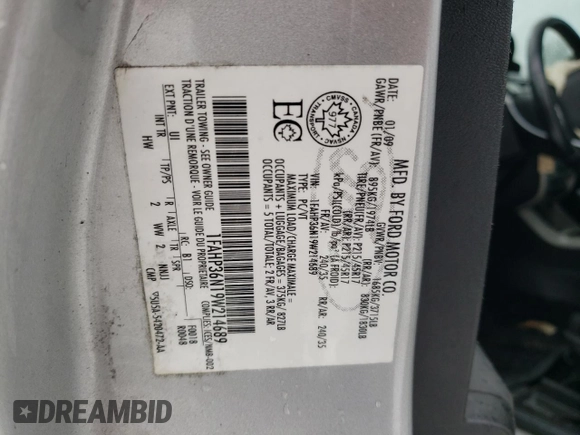 2009 Ford Focus SES with VIN 1FAHP36N19W214689, listed as a Copart auction lot 43001385 with 295,859 mi miles and Salvage Title. Bid and sale history available at carsss.com. Image 12.
