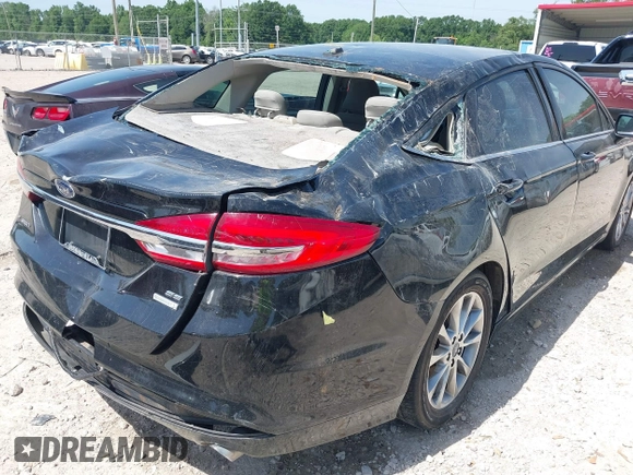 2017 Ford Fusion SE z VIN 3FA6P0HDXHR198388, wystawiony jako IAAI lot #42231069 z przebiegiem 143 709 mil mil oraz . Historia ofert i sprzedaży dostępna na DreamBid. Obrazek 6.