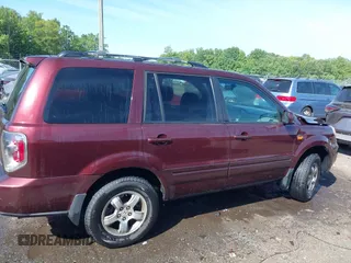 2007 Honda Pilot EX-L with VIN 5FNYF18547B006094, listed as a IAAI auction lot 42297719 with 235,632 mi miles and . Bid and sale history available at DreamBid. Image 13.