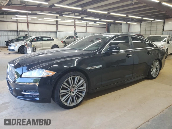 2015 Jaguar XJ with VIN SAJWJ1CD9F8V83885, listed as a Copart auction lot 65625135 with 81,794 mi miles and Clean title. Bid and sale history available at DreamBid. Image 1.
