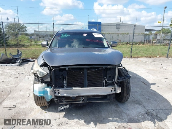 2013 Infiniti FX with VIN JN8CS1MU0DM140711, listed as a IAAI auction lot 40796518 with 179,386 mi miles and . Bid and sale history available at DreamBid. Image 13.