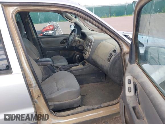 2006 Ford Escape XLT with VIN 1FMYU93186KC23802, listed as a IAAI auction lot 42611582 with 166,871 mi miles and . Bid and sale history available at DreamBid. Image 5.