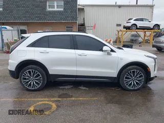 2024 Cadillac XT4 AWD Sport with VIN 1GYFZFR40RF223782, listed as a IAAI auction lot 42295745 with 7,254 mi miles and . Bid and sale history available at DreamBid. Image 14.
