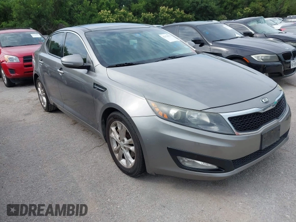 2013 Kia Optima EX z VIN 5XXGN4A73DG127493, wystawiony jako IAAI lot #42370932 z przebiegiem 173 412 mil mil oraz . Historia ofert i sprzedaży dostępna na DreamBid. Obrazek 1.