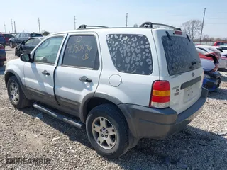 2004 Ford Escape XLT with VIN 1FMYU93164KA96674, listed as a IAAI auction lot 41780474 with 182,525 mi miles. Bid and sale history available at carsss.com. Image 3.