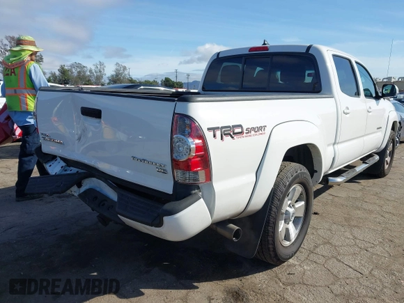 2015 Toyota Tacoma PreRunner with VIN 3TMKU4HN6FM044238, listed as a IAAI auction lot 41534623 with 196,490 mi miles and . Bid and sale history available at DreamBid. Image 4.