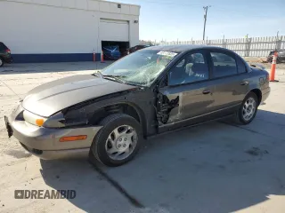 2000 Saturn SL z VIN 1G8ZK5276YZ227493, wystawiony jako Copart lot #48172835 z przebiegiem 105 806 mil mil oraz Szkoda całkowita • Salvage title. Historia ofert i sprzedaży dostępna na DreamBid. Obrazek 1.