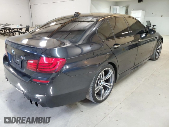 2013 BMW M5 z VIN WBSFV9C5XDC772672, wystawiony jako Copart lot #53732175 z przebiegiem 83 665 mil mil oraz Tytuł czysty. Historia ofert i sprzedaży dostępna na DreamBid. Obrazek 3.