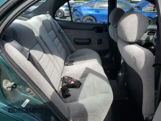 1996 Chevrolet Prizm z VIN 1Y1SK5285TZ058572, wystawiony jako Copart lot #51303845 z przebiegiem 87 109 mil mil oraz Szkoda całkowita • Salvage title. Historia ofert i sprzedaży dostępna na DreamBid. Obrazek 10.