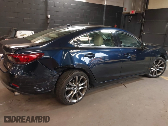 2017 Mazda 6 Grand Touring with VIN JM1GL1W51H1101519, listed as a IAAI auction lot 42132215 with 145,796 mi miles. Bid and sale history available at carsss.com. Image 6.