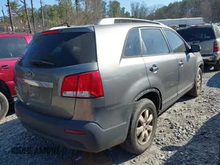 2013 Kia Sorento LX with VIN 5XYKT4A27DG403903, listed as a IAAI auction lot 41658634 with 179,994 mi miles. Bid and sale history available at carsss.com. Image 4.
