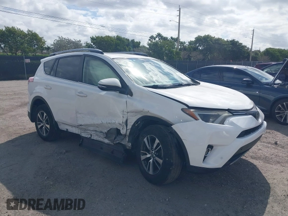 2018 Toyota RAV4 XLE with VIN JTMWFREV7JJ731893, listed as a IAAI auction lot 41567850 with 141,269 mi miles. Bid and sale history available at carsss.com. Image 1.