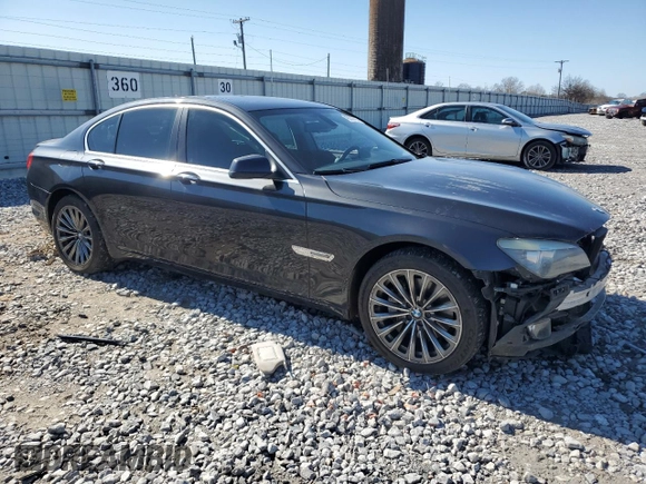 2012 BMW 7 Series 740i with VIN WBAKA4C58CC613763, listed as a Copart auction lot 43557415 with 0 mi miles and Salvage Title. Bid and sale history available at carsss.com. Image 4.