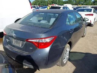 2016 Toyota Corolla L with VIN 2T1BURHE4GC603048, listed as a IAAI auction lot 42061311 with 114,407 mi miles and . Bid and sale history available at DreamBid. Image 4.